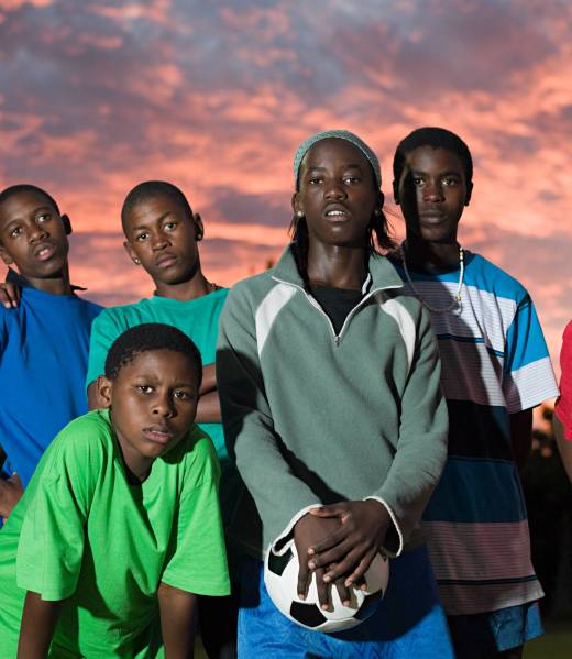 Group of teenage boys with football